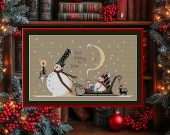 Patrón de punto de cruz navideño primitivo en PDF: Muñeco de nieve y trineo: ¡Viene a la ciudad! - Muestra de arte popular para decoración navideña de invierno