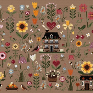 May include: A cross-stitch pattern featuring a brown house with a red heart above it, surrounded by a variety of flowers, including sunflowers, tulips, and daisies. There are also birds, bees, and butterflies in the design.