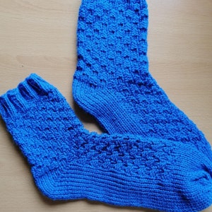 Knitting ring instructions for socks in a checkerboard pattern made of knit and purl stitches
