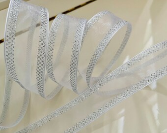 1.5” Silver Glitter Dot Edges Along a Sheer White Center Wired Ribbon - Sold By The Yard