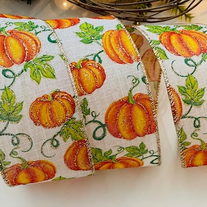 2.5” Pumpkin Sparkle Wired Ribbon: Beige, Orange, & Green #189 - Sold By The Yard