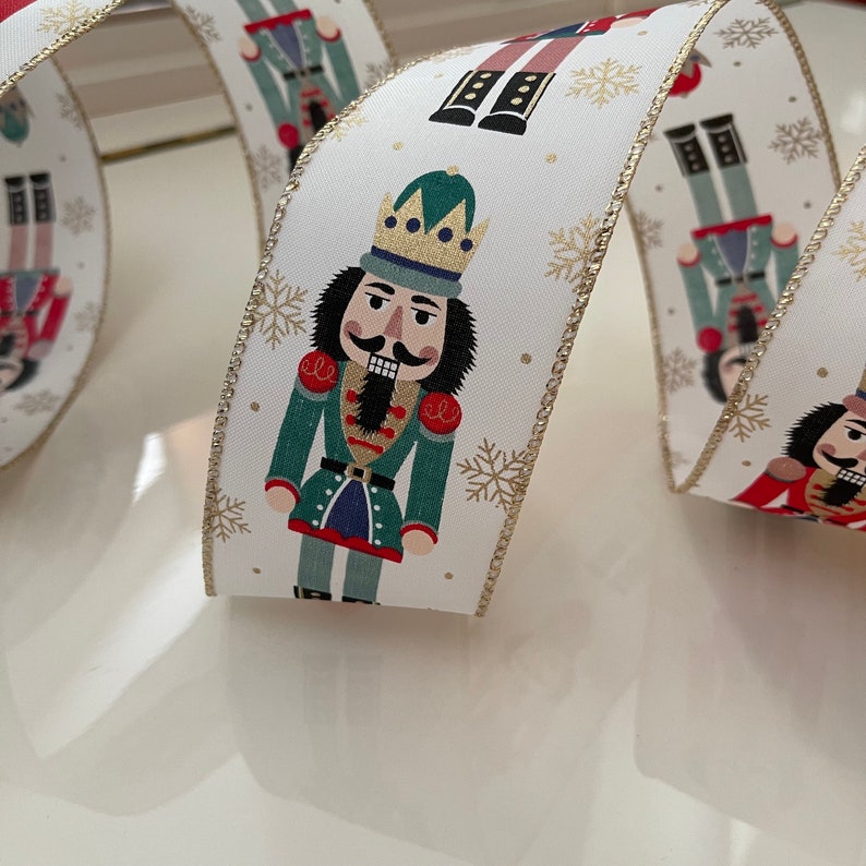 Nutcrakrt Ribbon 2.5” Nutcracker & Snowflakes Wired Ribbon: Red, Green, Gold, White ...
