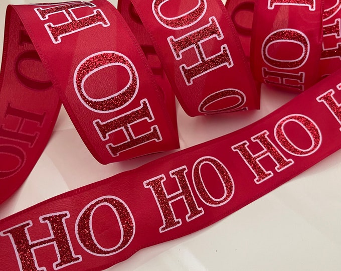 2.5” Red & White Glittery “ Ho Ho Ho “ Wired Ribbon - Sold By The Yard