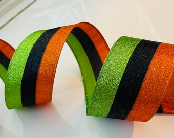 2.5” Green, Black, & Orange Glitter Wired Ribbon - Sold By The Yard