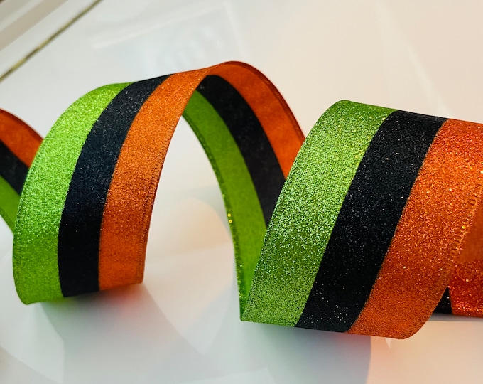 2.5” Green, Black, & Orange Glitter Wired Ribbon - Sold By The Yard