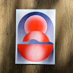 small risograph card of a red blue geometric landscape