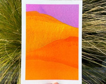 紫と黄色の砂丘の風景を描いた小さなリソグラフ印刷