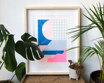 A3 risograph print of a pink and blue abstract landscape