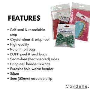 May include: Clear plastic bags with a resealable strip, a white header, and a euro slot hole. The bags are 3.5 inches wide and have a 3-inch resealable lip. The bags are shown with a green and white bow tie, a blue tag, and a pink card with the text "You're Sizzlin!" and "Magnetic Holders".