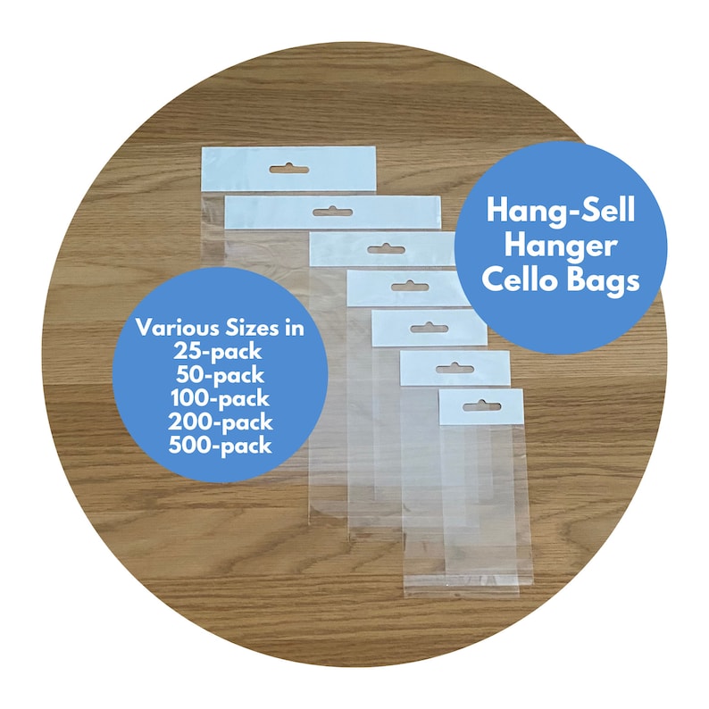 May include: Assortment of clear plastic hang-sell cello bags with a white header and a hole for hanging. The bags are displayed on a wooden surface. Various Sizes in 25-pack, 50-pack, 100-pack, 200-pack, 500-pack. Hang-Sell Hanger Cello Bags.