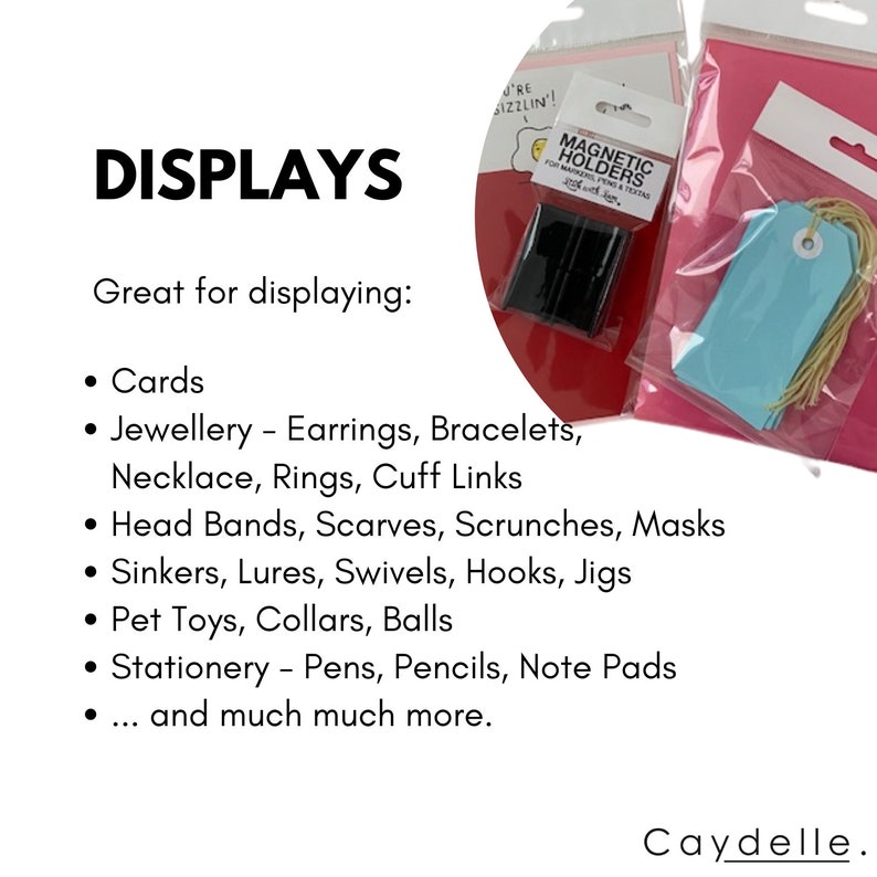 May include: A set of magnetic holders for displaying cards, jewelry, headbands, and other small items. The holders are black and come in a clear plastic package. The text on the package reads "Magnetic Holders for Makers, Planners & Tags".