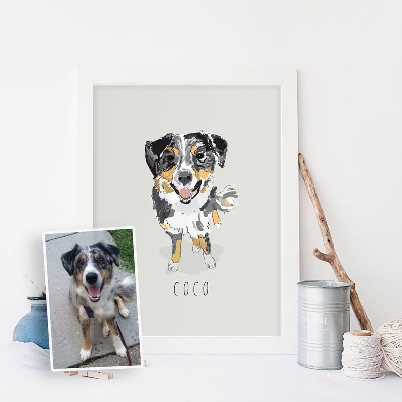 May include: A framed art print of a dog, with a watercolor-style illustration. The dog is depicted in black, white, and tan colors, with the name "COCO" below. A smaller photo of the dog is also present.