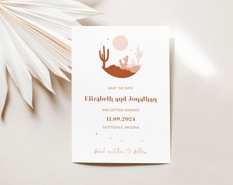 May include: Save the date card with a desert landscape illustration featuring a pink moon, cacti, and mountains. The text reads "Save the Date, Elizabeth and Jonathan are getting married, 11.09.2024, Scottsdale, Arizona, formal invitation to follow."