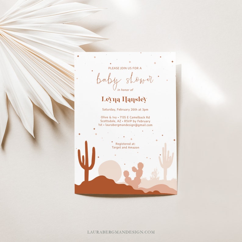 May include: A baby shower invitation with a desert theme. The invitation features a pink and brown cactus illustration with a starry night sky. The text reads "Please join us for a baby shower in honor of Leyna Hansley. Saturday, February 26th at 3pm. Olive & Ivy, 7135 E Camelback Rd, Scottsdale, AZ. RSVP by February 1st. laurabergmandesign@gmail.com. Registered at: Target and Amazon."