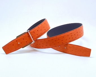 Lo, a handmade reversible 38mm belt of genuine ostrich leather, in bright orange! An accessory of fine craftsmanship and unique taste