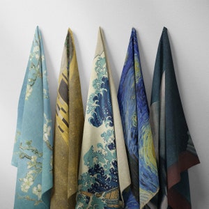 May include: Five different fabric panels with various artistic prints. The panels are all rectangular and hang from a white wall. The prints include a blue and white floral design, a yellow and brown abstract design, a blue and white wave design, a blue and yellow starry night design, and a blue and black abstract design.