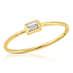Le Bohémienne - custom handmade 14-karat gold stacking ring with baguette diamond