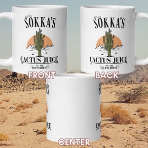 May include: White ceramic mug featuring the text "MASTER SOKKA'S CACTUS JUICE" with a desert landscape illustration. The mug also includes the phrase "IT'S THE QUENCHIEST" below the main text. The design is printed on both sides of the mug.
