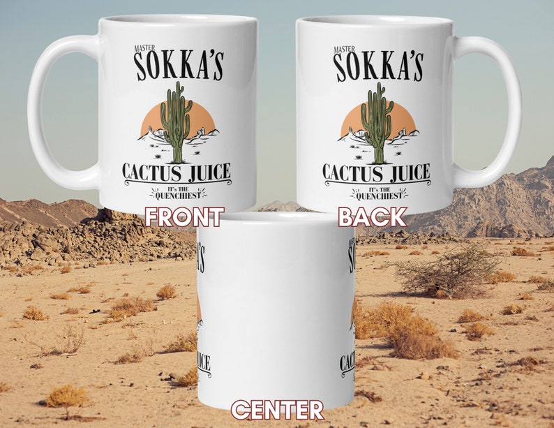 May include: White ceramic mug featuring the text "MASTER SOKKA'S CACTUS JUICE" with a desert landscape illustration. The mug also includes the phrase "IT'S THE QUENCHIEST" below the main text. The design is printed on both sides of the mug.