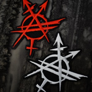 May include: Two embroidered patches with a black circle and intersecting lines. The top patch is red with white lines and the bottom patch is white with black lines. The text "etsy.com/shop/brastSoul" is visible in the image.