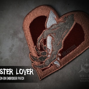 Monster Lover Hand Holding Terato Iron-On Embroider Patch