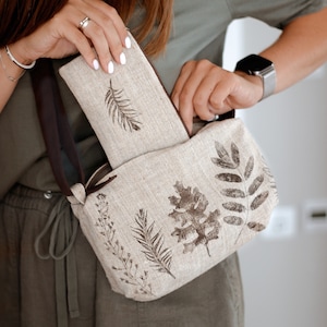 Nature print linen small crossbody bag simple style. Shoulder purse. Adjustable strip bag. Feather eco printing. 3 pocket bag. Natural tote