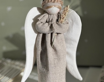 Ukrainian Handmade Folk Art doll Motanka holding wheat ear while praying