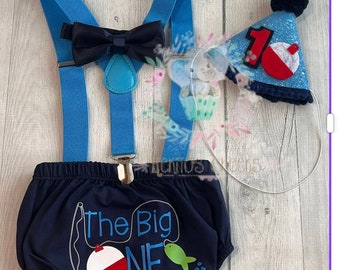 The O-fish-ally ONE ,big one theme cake birthday navy diaper cover  and turquoise suspender,  and navy bow tie 1st Birthday.