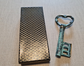 Vintage corkscrew brass key patina 60s