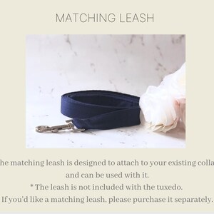 May include: A navy blue fabric dog leash coiled on a surface, featuring a silver-toned metal swivel snap hook at one end. The text MATCHING LEASH is displayed above the leash, with additional text below explaining the item is sold separately.