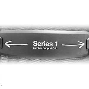 May include: Monochrome image of a lumbar support clip, labeled "Series 1". The clip is rectangular with a dark gray finish, featuring a white arrow pointing left and right. Two metal clips are on either side. The NTH FORM logo is in the bottom left corner.
