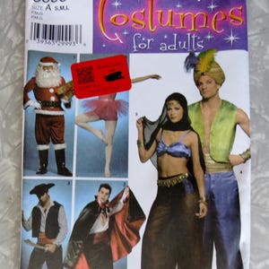 May include: A Simplicity 3999 sewing pattern envelope for adult costumes, featuring illustrations of a Santa Claus suit, a pink tutu, a pirate outfit, a vampire cape, and a genie-inspired ensemble with a purple top, black skirt, and green vest.
