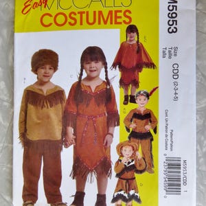 May include: McCall's Costumes sewing pattern M5953 for sizes CDD 2-3-4-5. The envelope features illustrations of children wearing brown suede-look outfits with fringe detailing, including tunics, dresses, and pants. Text includes Easy McCall's Costumes.