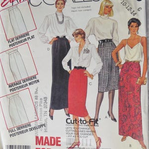 May include: A sewing pattern for a skirt with three different styles: flat, average, and full. The pattern is for sizes 10-12-14 and is called "Cut-to-Fit". The pattern is made by McCall's.