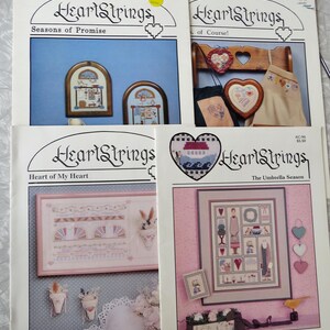 Lot- 4 Heartstrings Cross Stitch Books: Season of Promise AC27, The Umbrella Season AC94 & Hearts Of Course! AC33 Heart of My AC48 Pat Thode
