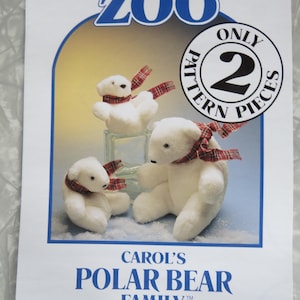 May include: A Carol's Zoo sewing pattern cover for a Polar Bear Family. The cover features three white plush polar bears wearing red and green plaid scarves. Text includes Carol's Zoo, Only 2 Pattern Pieces, and Carol's Polar Bear Family.
