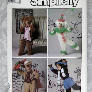 May include: Simplicity sewing pattern 8275 size SM featuring four variations of bear costumes. The images show a brown bear with a pink bow, a white bear clown with green trim, a tan bear with a plaid scarf, and a black bear with a blue skirt.