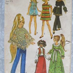 May include: Vintage Simplicity sewing pattern 9138 for a 15 1/2 inch doll. The pattern features illustrations of six different doll outfits, including dresses, pants, and tops. The pattern is marked with the price of 85 cents.
