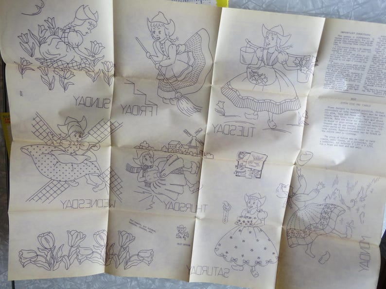 May include: A vintage paper featuring seven illustrations of Dutch girls, each representing a day of the week. The drawings are in black ink, with the days of the week written in reverse. The paper is folded and has a yellowed appearance.