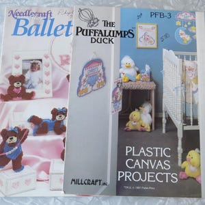 May include: Two instructional booklets for plastic canvas projects. The left booklet features teddy bears in ballet attire. The right booklet, titled The Puffalumps Duck, displays duck-themed nursery decor, including a crib and plush toys.