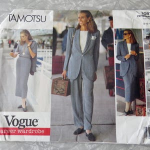 May include: A Vogue pattern for a career wardrobe, featuring a woman in a gray pinstripe suit and skirt. The pattern number is 1087 and the sizes are 8-10-12. The pattern is from the Tamotsu collection.