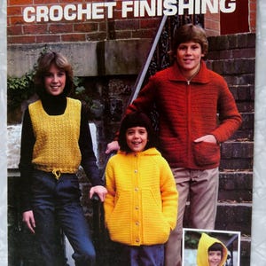 May include: A crochet pattern booklet featuring three children wearing crocheted garments. The cover features the title "Improve Your CROCHET FINISHING" and the text "Leaflet 120 $2.00". The booklet is by Barbara Johnston.