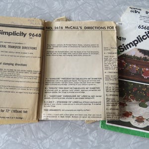 May include: A vintage Simplicity sewing pattern for a Christmas tree skirt with a green background and a white felt tree skirt with red and white carolers. The pattern number is 6568 and the instructions include directions for making a 72-inch tree skirt.