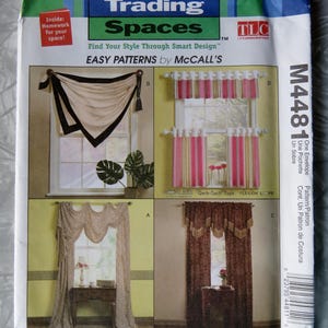 May include: A McCall's pattern envelope for "Trading Spaces" featuring various window treatment designs. The cover displays four different curtain and valance styles, with the "Trading Spaces" and TLC logos prominently displayed.