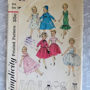May include: Vintage Simplicity doll pattern, size 18 inches, featuring illustrations of dolls in various dresses and outfits. The pattern cover is aged, with the text "Simplicity Printed Pattern 35c" and the number "2745" visible.