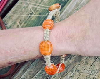 Handmade Hemp Bracelet w Orange Oval Beads
