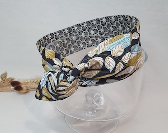 Rigid hair band headband reversible black floral and graphic wire