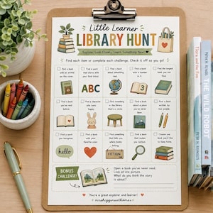 May include: A Little Learner Library Hunt activity sheet on a brown clipboard. The paper features a grid of reading challenges with illustrations of books, a globe, and a magnifying glass. Text includes instructions and a bonus challenge section.