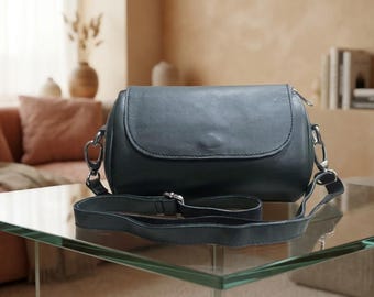 Bolso bandolera cilíndrico minimalista de piel auténtica hecho a mano