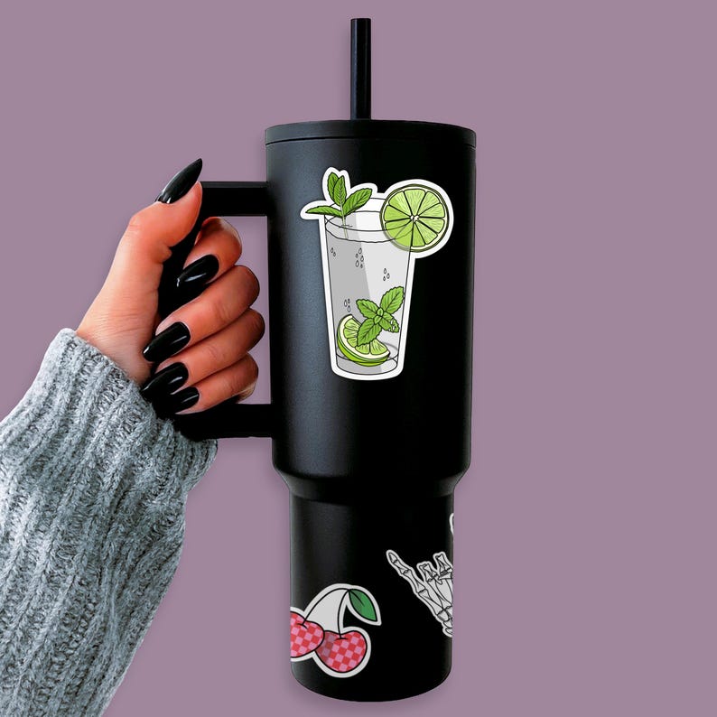 Tropical vacation vibes green mojito cocktail with lime and mint garnish die-cut vinyl sticker stuck to a water flask.
